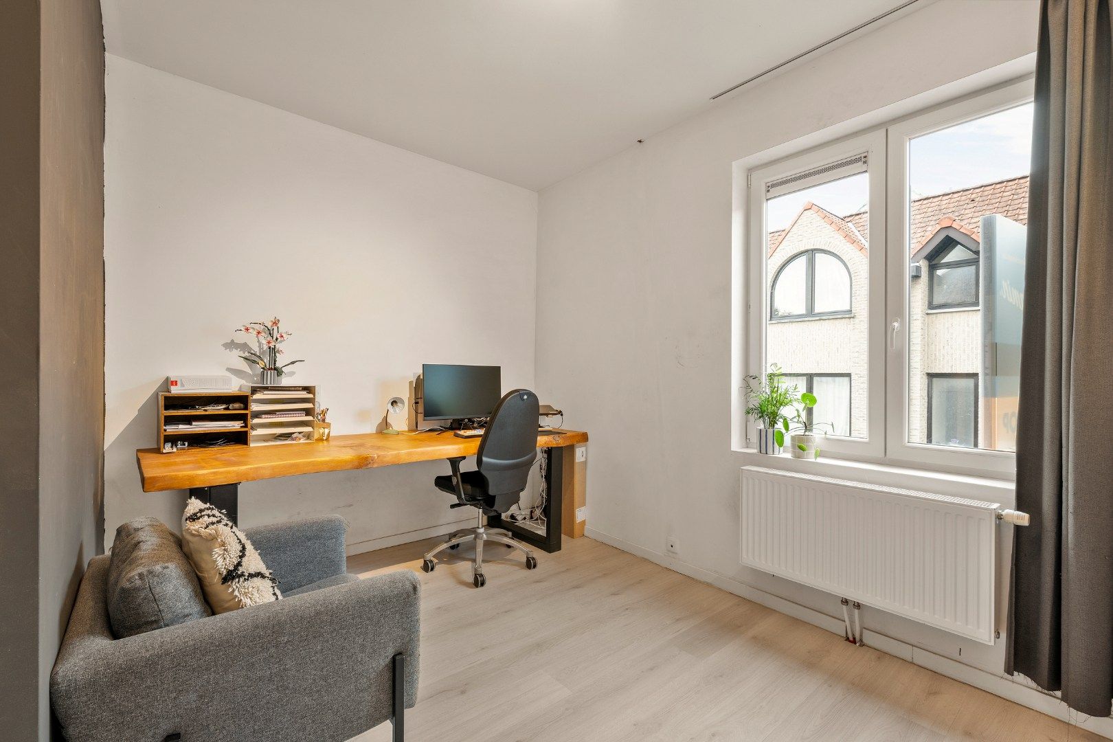 Instapklare rijwoning met open keuken en 2 slaapkamers in Kortrijk-centrum foto 12