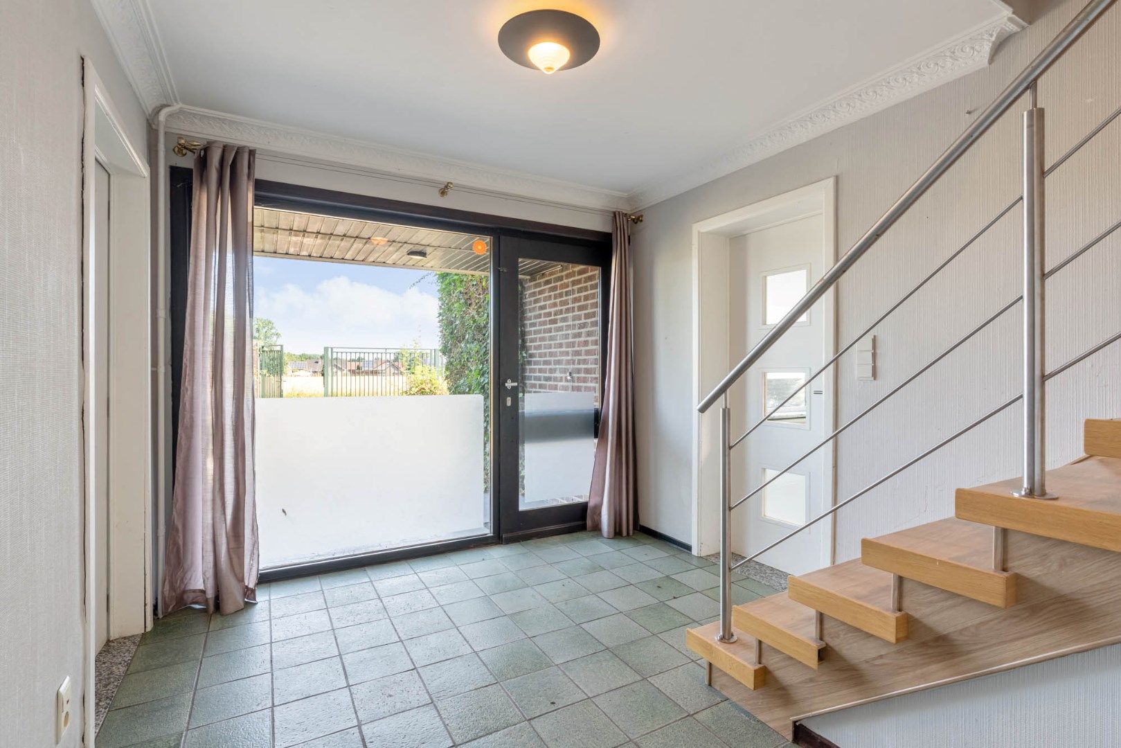 Multifunctioneel gebouw bestaande uit een woning, een winkel en een magazijn/werkplaats gelegen op een rustige locatie te Voorshoven! foto 6