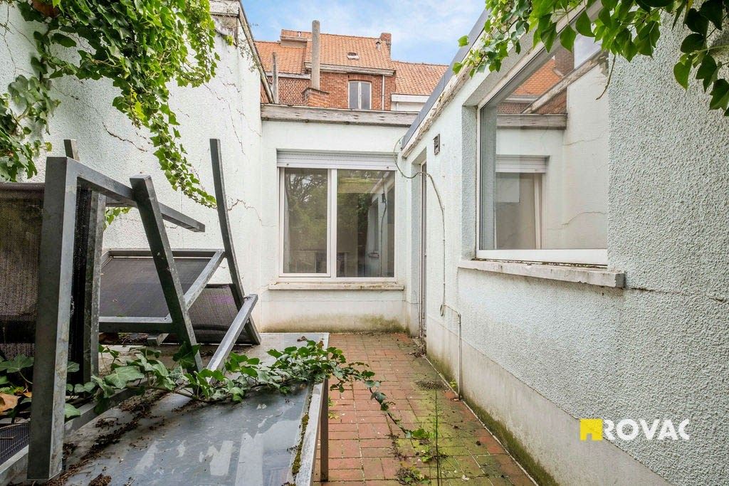 Te renoveren handelspand met woonst in hartje Izegem foto 18