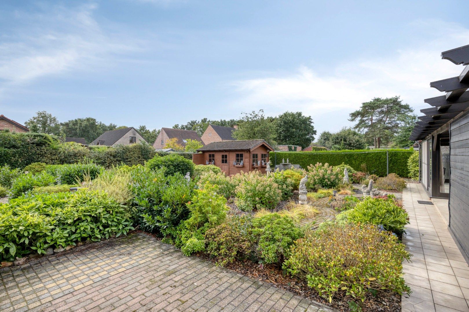 Gelijkvloerse woning met 2 slaapkamers op een mooi Z gericht perceel van 819 m² ! foto 24