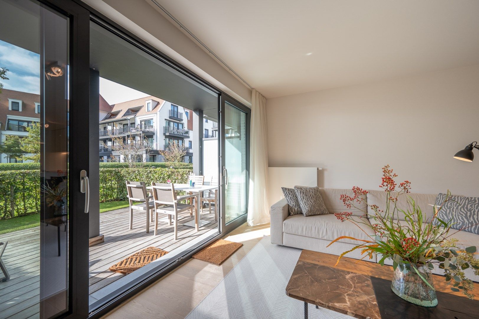 Recent en zonnig tuinappartement aan meer Duinenwater foto 18