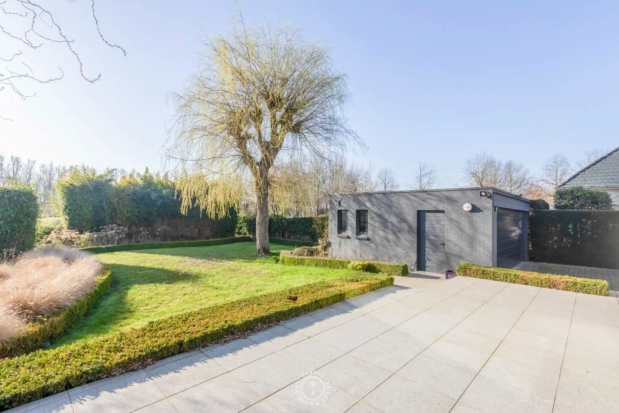 Een unieke combinatie van wonen, werken en genieten in Waasmunster foto 25