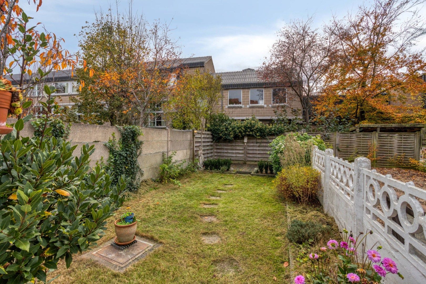 Centrumwoning met mini-atelier, 4 slks en zuid-gerichte tuin. foto 3