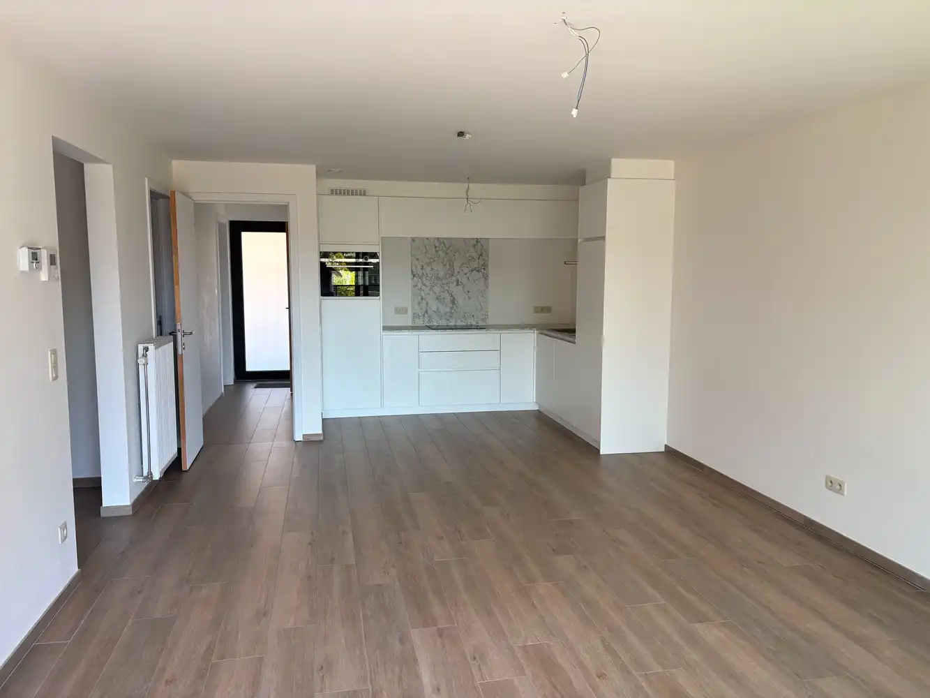Mooi recent appartement met 2 slk, terras en ondergrondse parking met berging foto 8