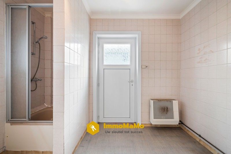 Te renoveren woonst in een rustige wijk te koop in Moerbeke foto 9