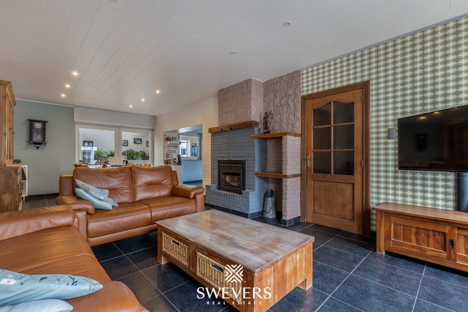 Gezellige woning met veranda, garage & zonnige tuin foto 3