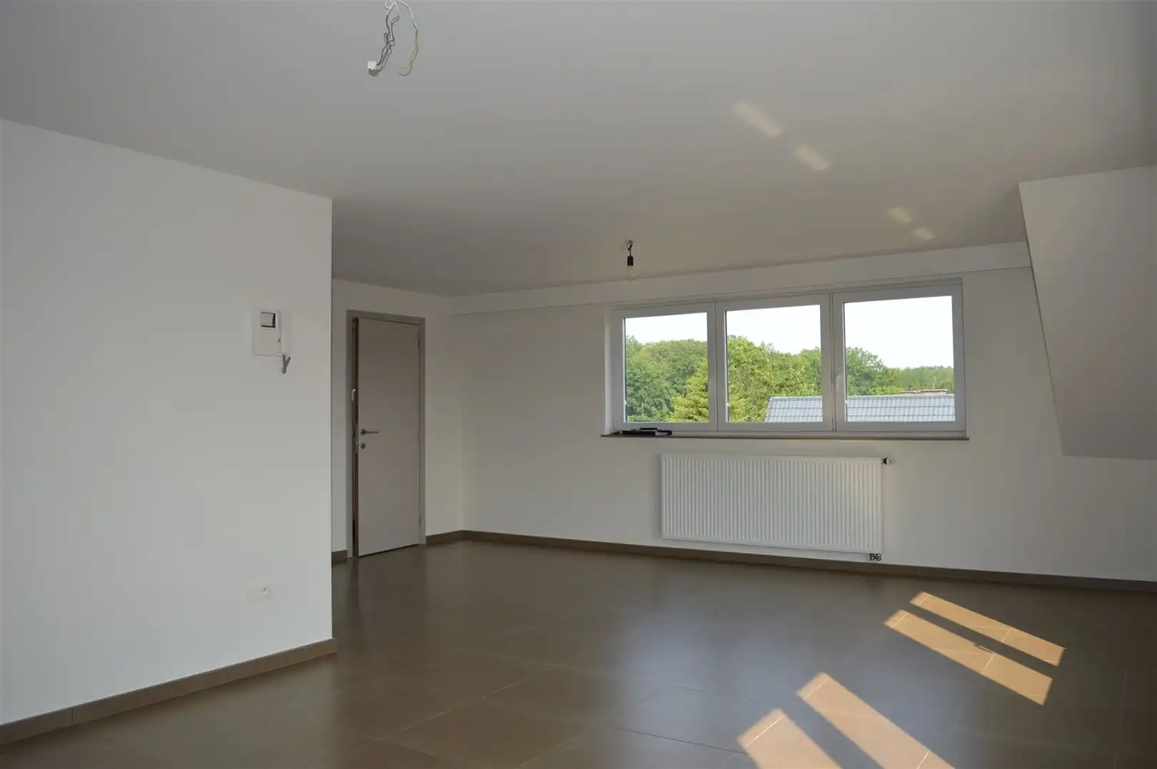 TE HUUR: Ruim appartement met 3 slaapkamers te Munsterbilzen! foto 3