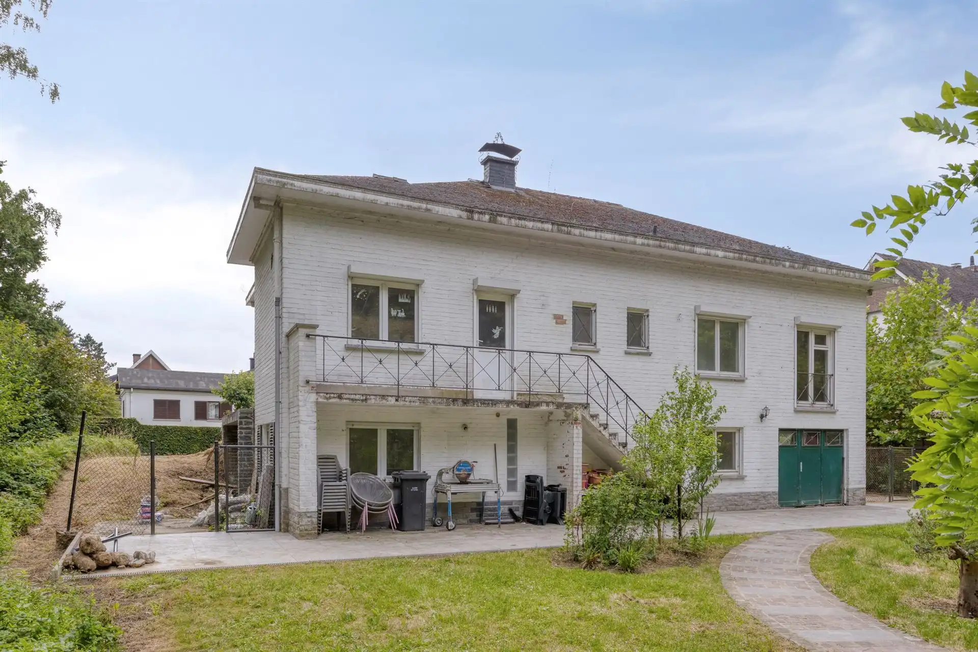 Klassieke villa met enorm potentieel in rustige wijk foto 4