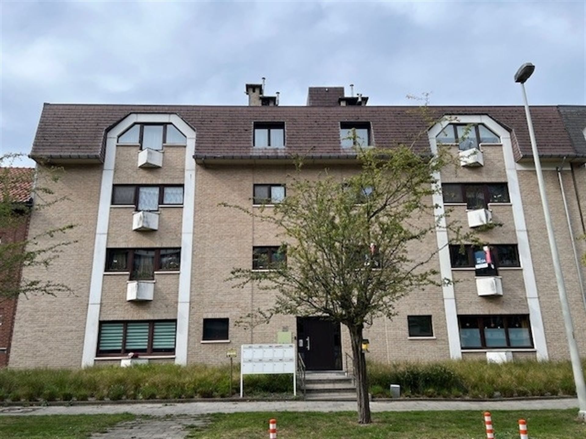 Charmant appartement met terras en garage! foto {{pictureIndex}}