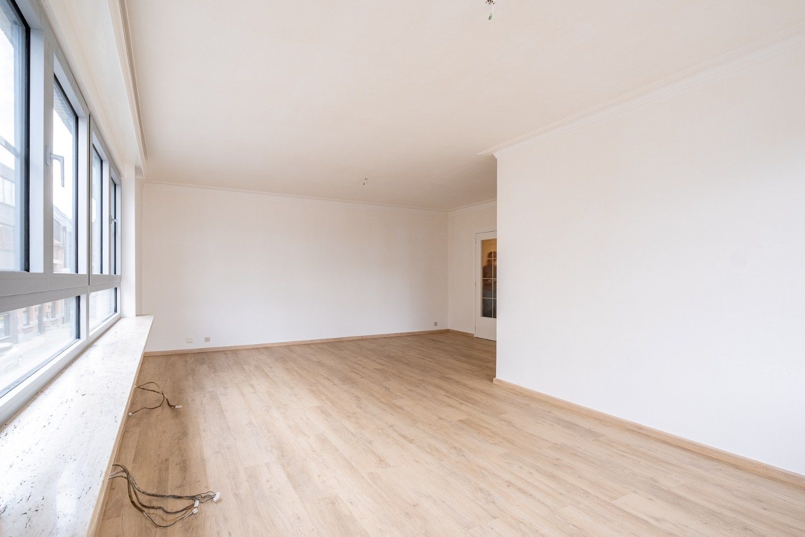 Ruim 3-slaapkamer appartement (95 m²) op de 1ste verdieping met lift aan centrum Beveren!  foto 5