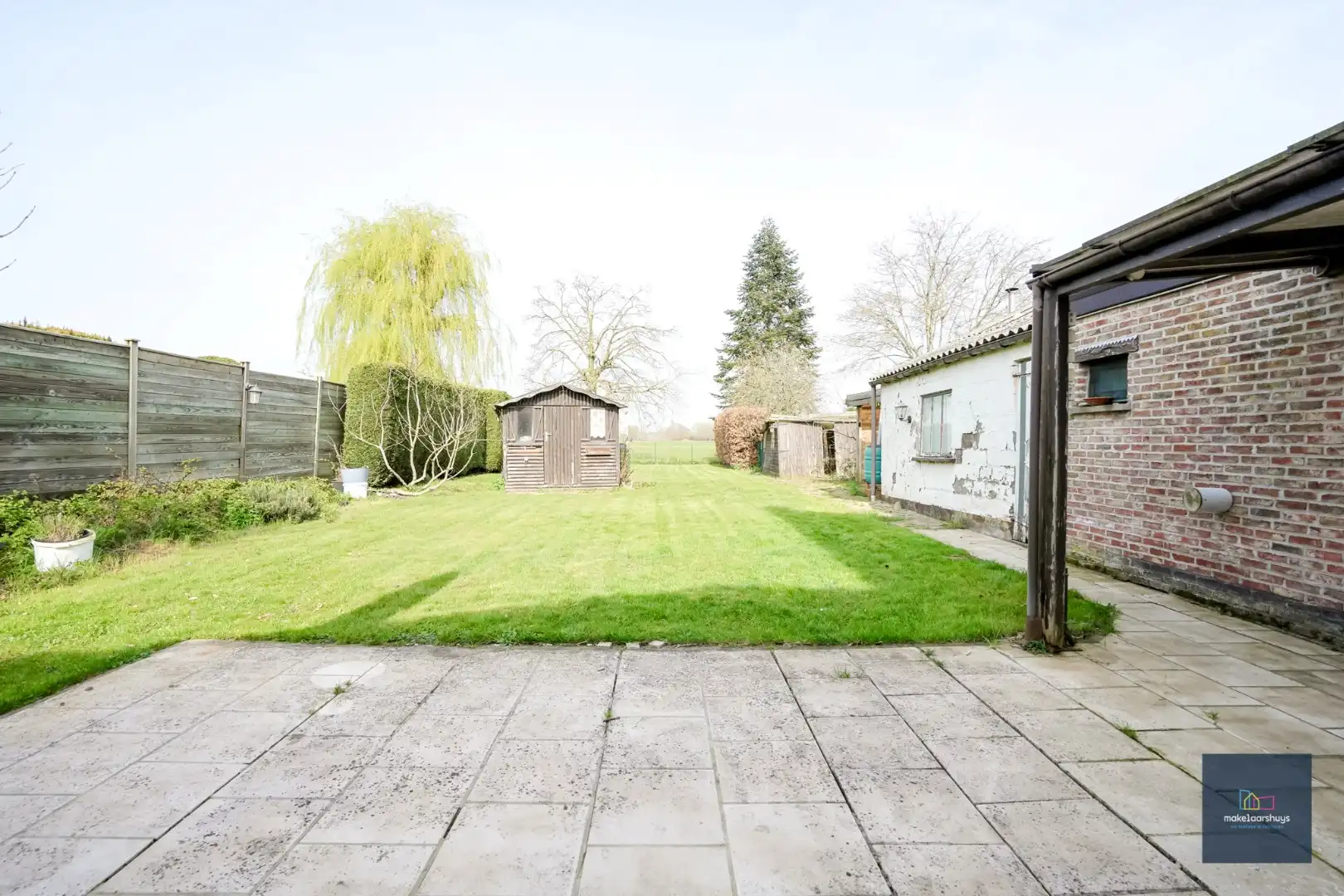 Ruime  halfopen bebouwing  met  zonnige tuin, terras en garage in Waarschoot  foto 26