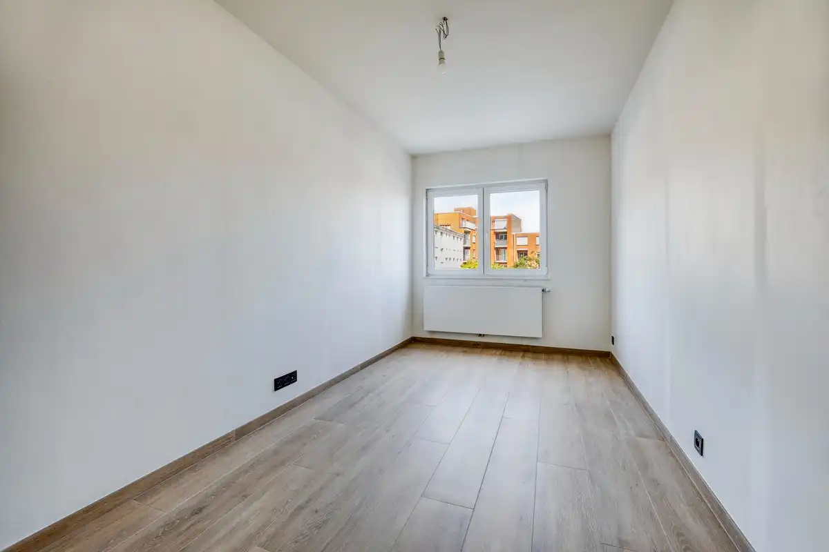 Luxueus, volledig gerenoveerd appartement met 3 slaapkamers, autostaanplaats en kelder foto 9