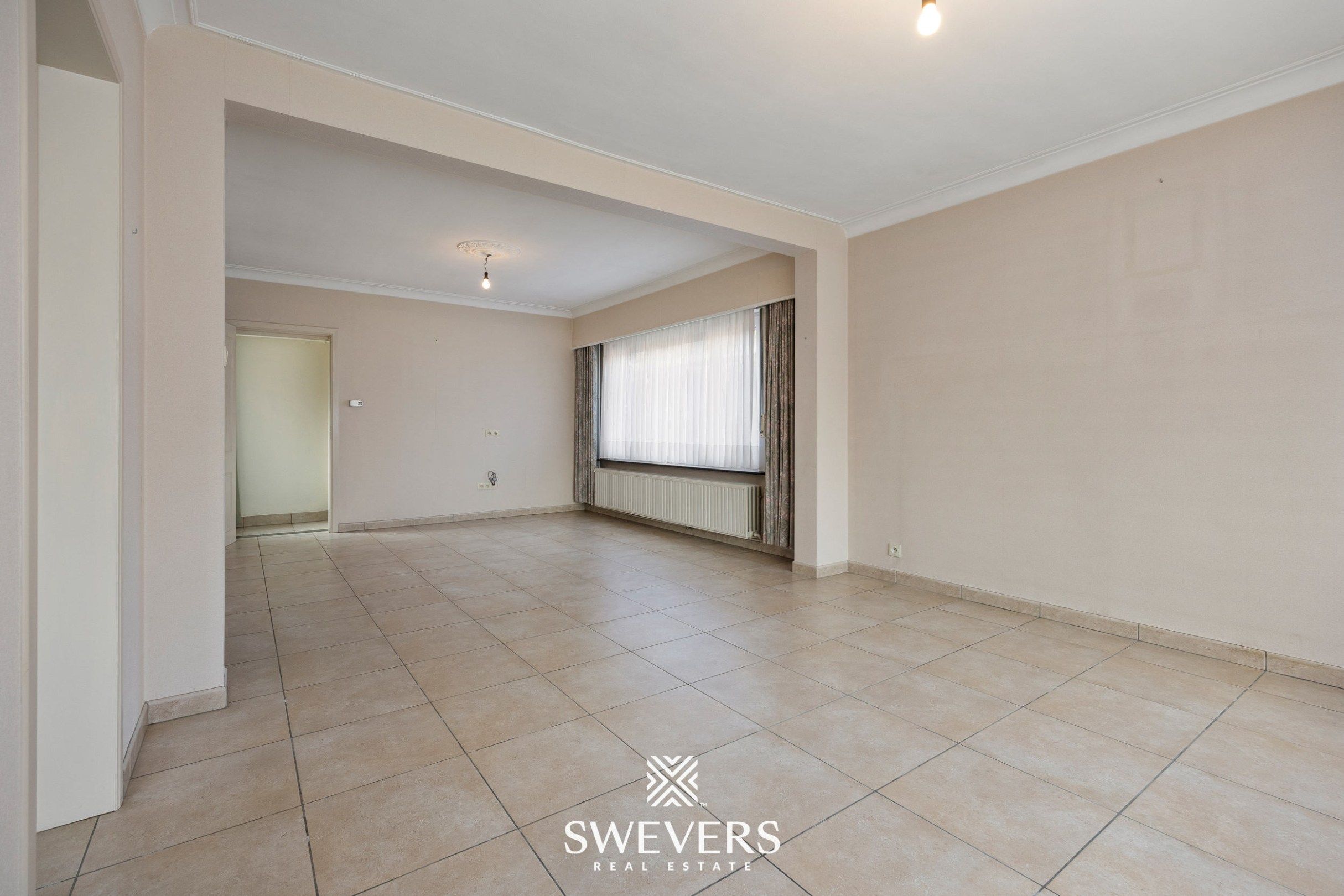 Te renoveren ruime gezinswoning met vijf slaapkamers en uitbreidingsmogelijkheden foto 4