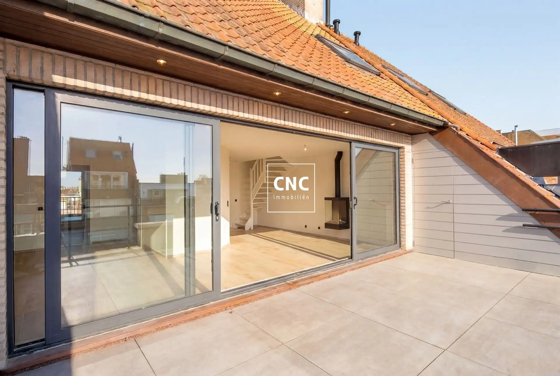 Lichtrijk triplexappartement met 4 slaapkamers en terrassen foto 2
