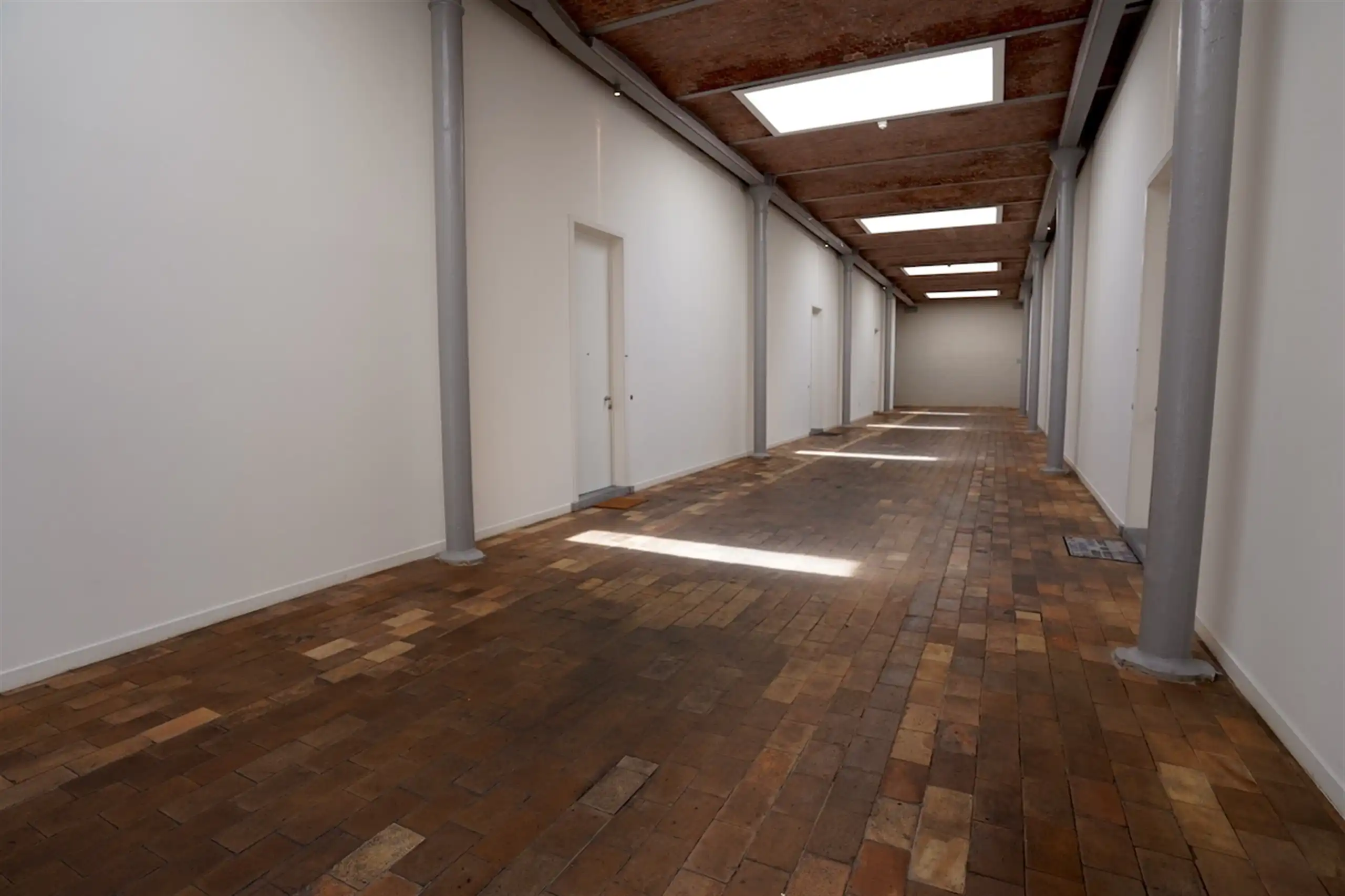 Verrassende, heldere loft met plafondhoogten van 6 m! foto 8