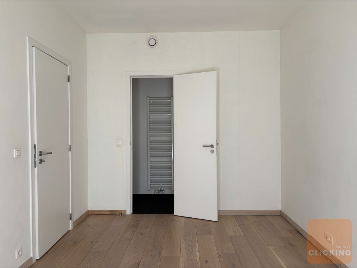 Tof 1 slaapkamerappartement met terras en tuintje foto 11