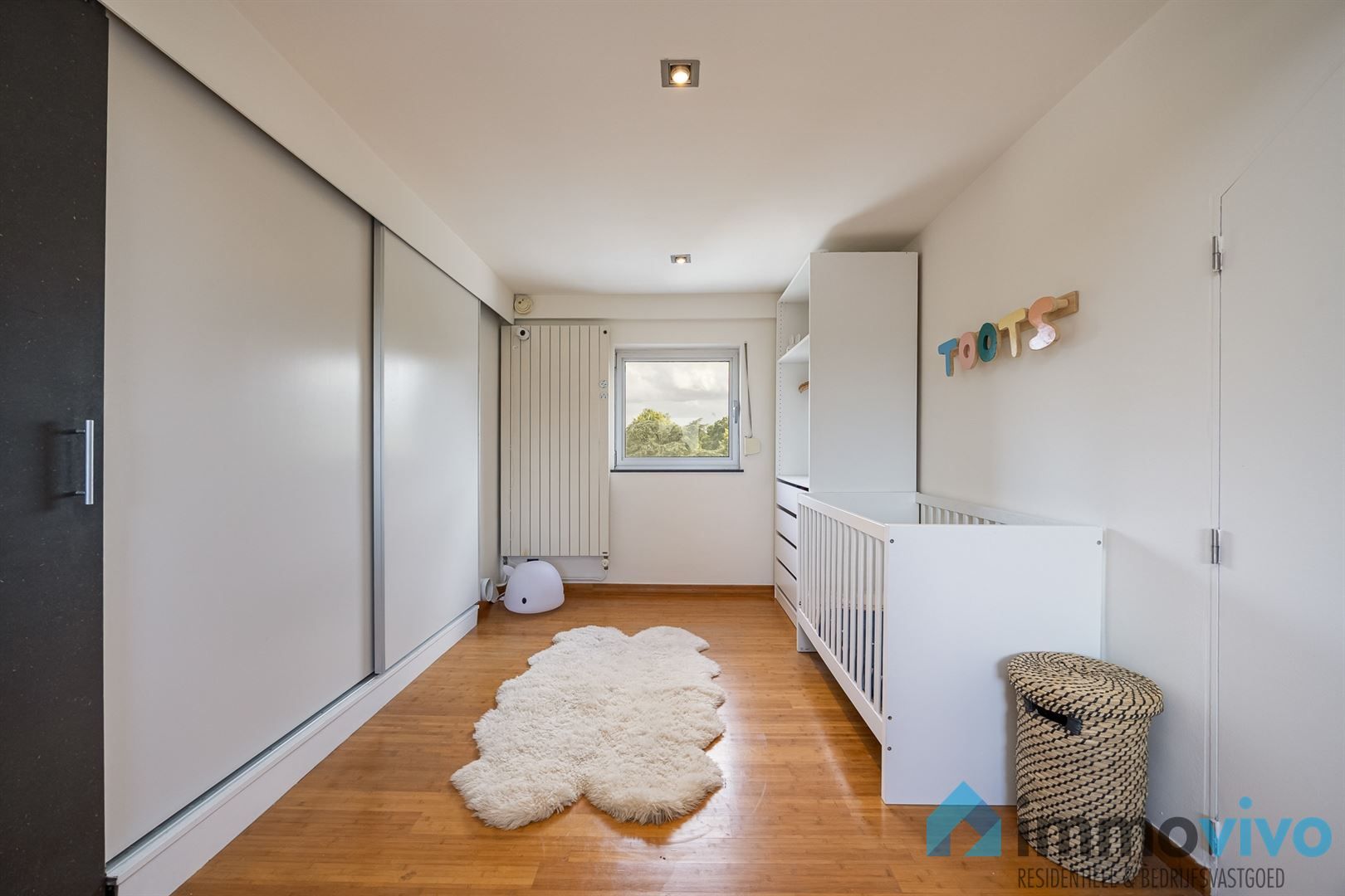 Lichtrijke woning met aangename tuin en garage met oprit foto 19