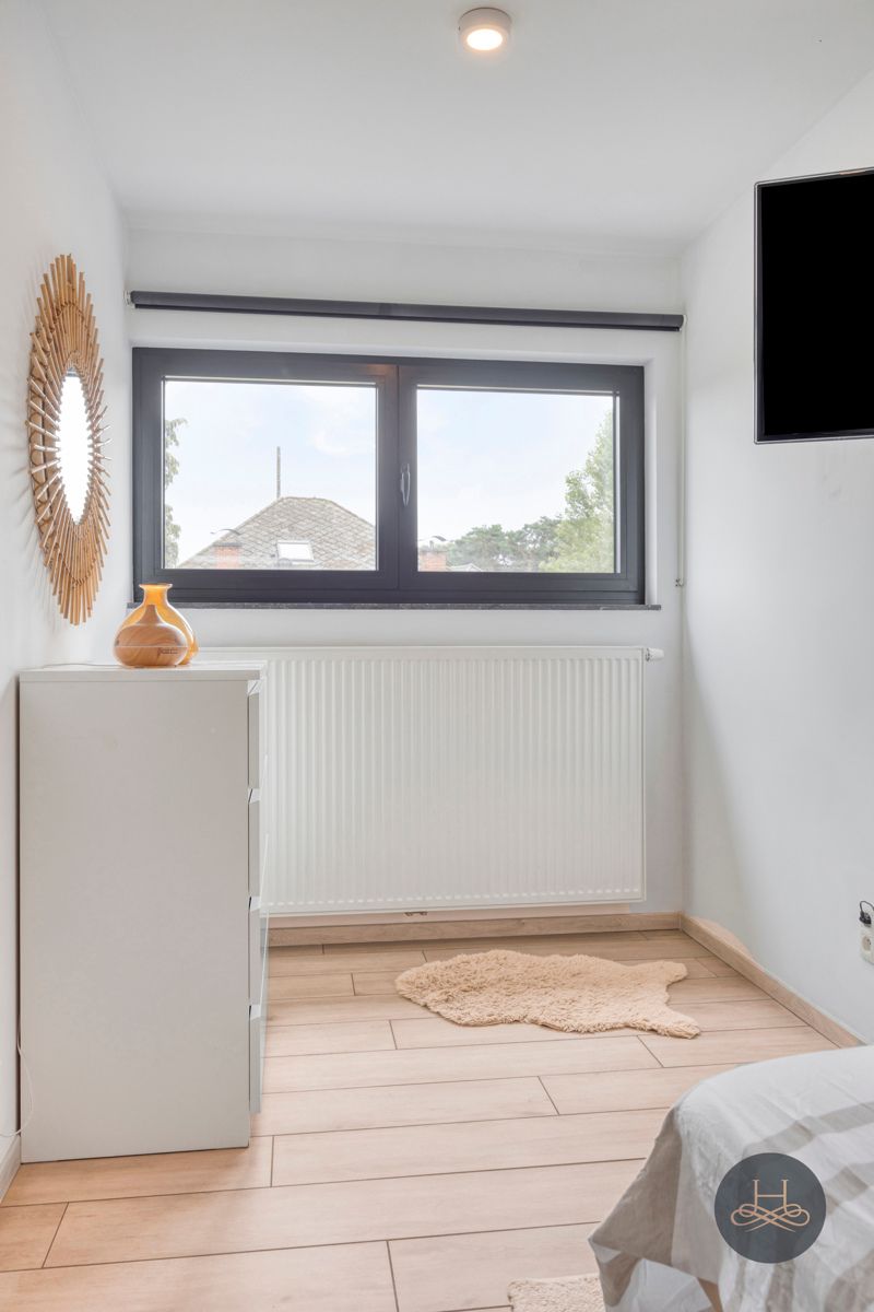 Strakke, moderne BEN woning te Tremelo foto 22
