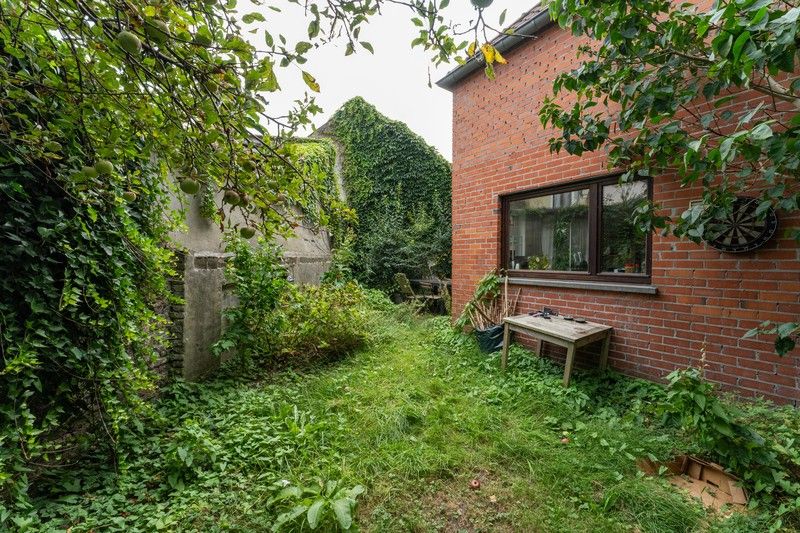 Ideale gezinswoning met 3 slaapkamers met een charmante tuin foto 14