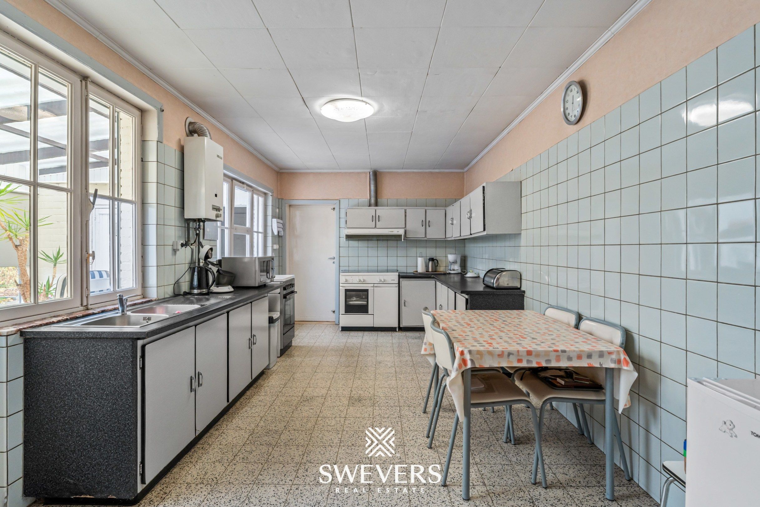 Charmante halfopen gezinswoning met potentieel (8are) op toplocatie in Diepenbeek foto 10