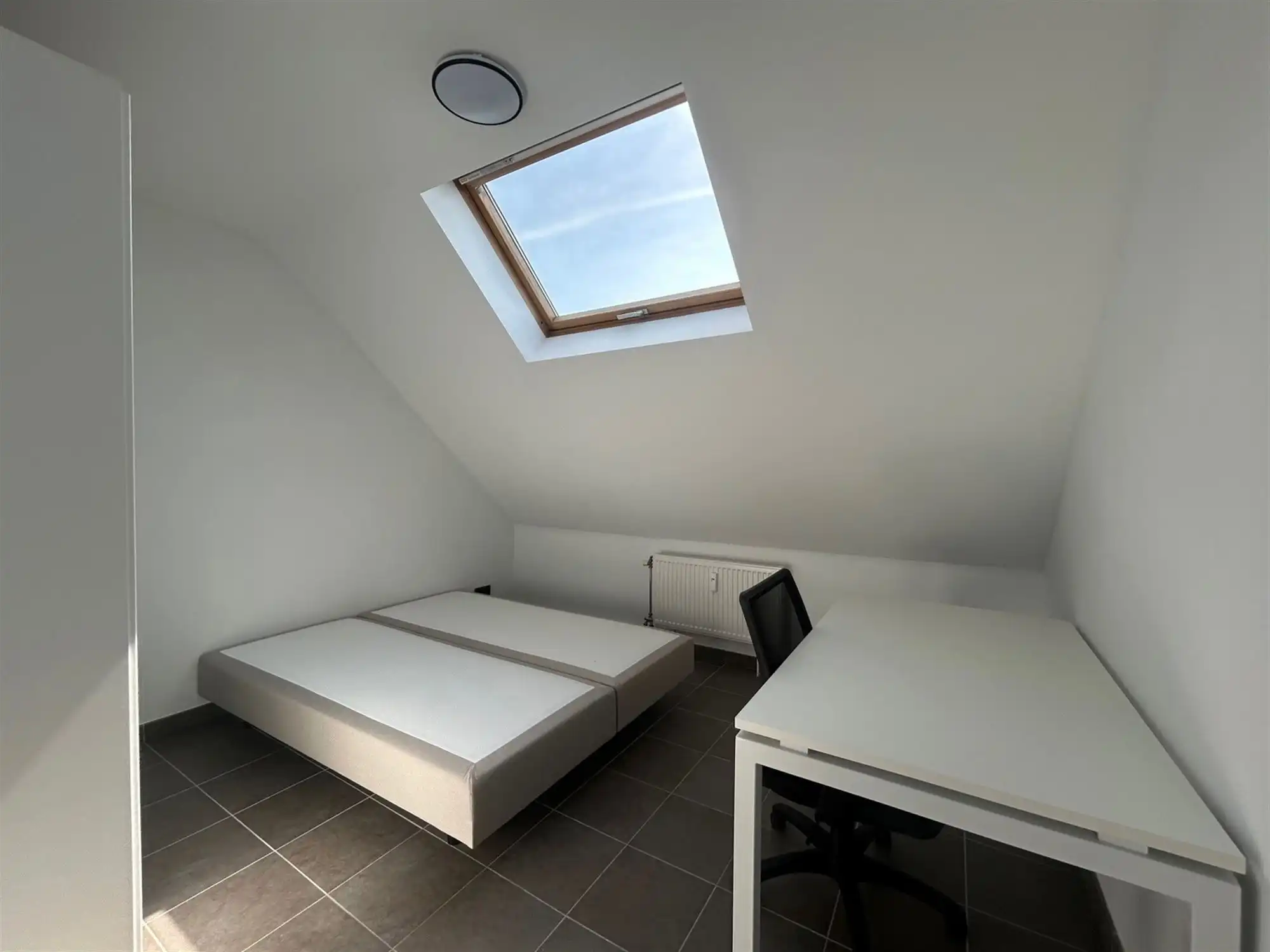 Zeer ruime studio (32m²) Tiensestraat Leuven foto 5