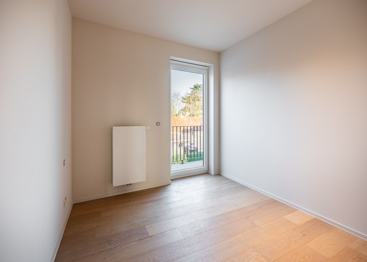 Stijlvol  gerenoveerd 2 slaapkamer appartement op de markt in de Panne foto 10