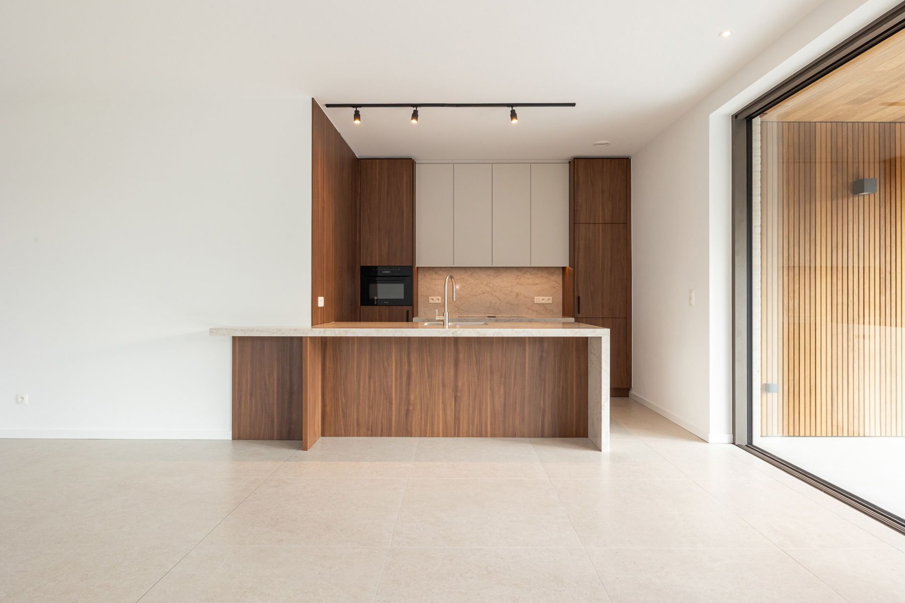 Prestigieus nieuwbouwappartement met ruime tuin en terras. foto 5