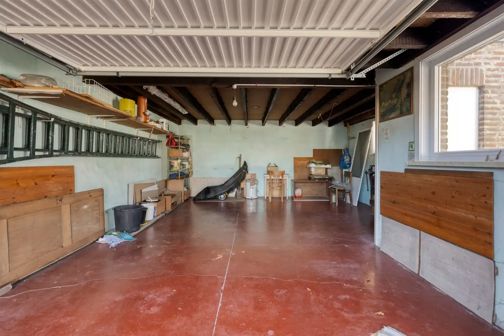 Rustig gelegen open bebouwing met grote garage en 3 slaapkamers op een perceel van 500 m². foto 16