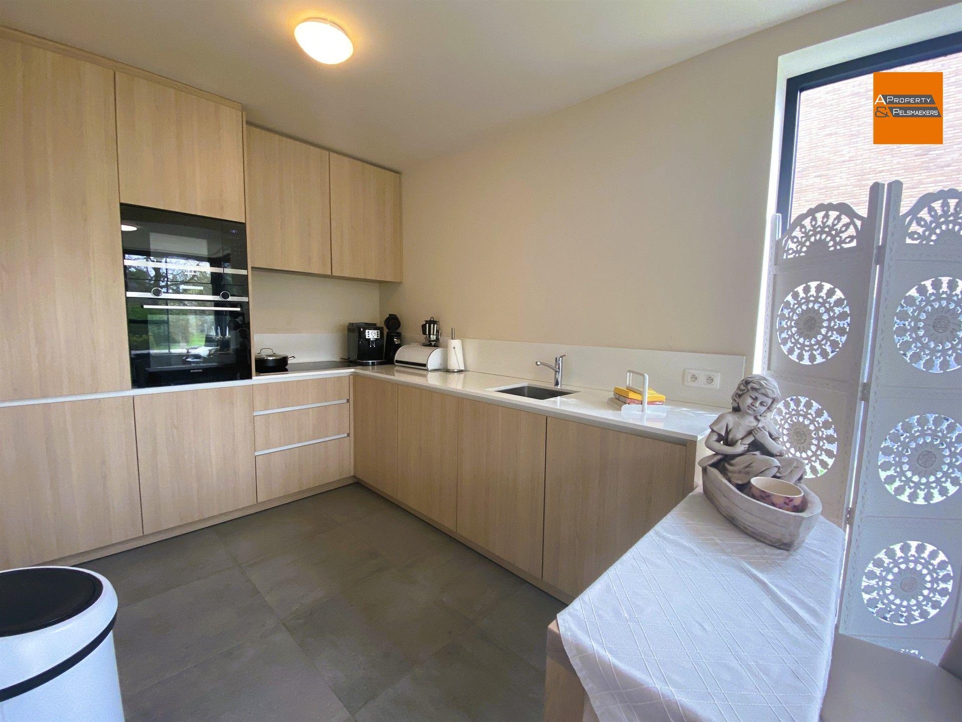 Modern en lichtrijk gelijkvloers appartement  – ideaal gelegen tussen Brussel en Leuven foto 3