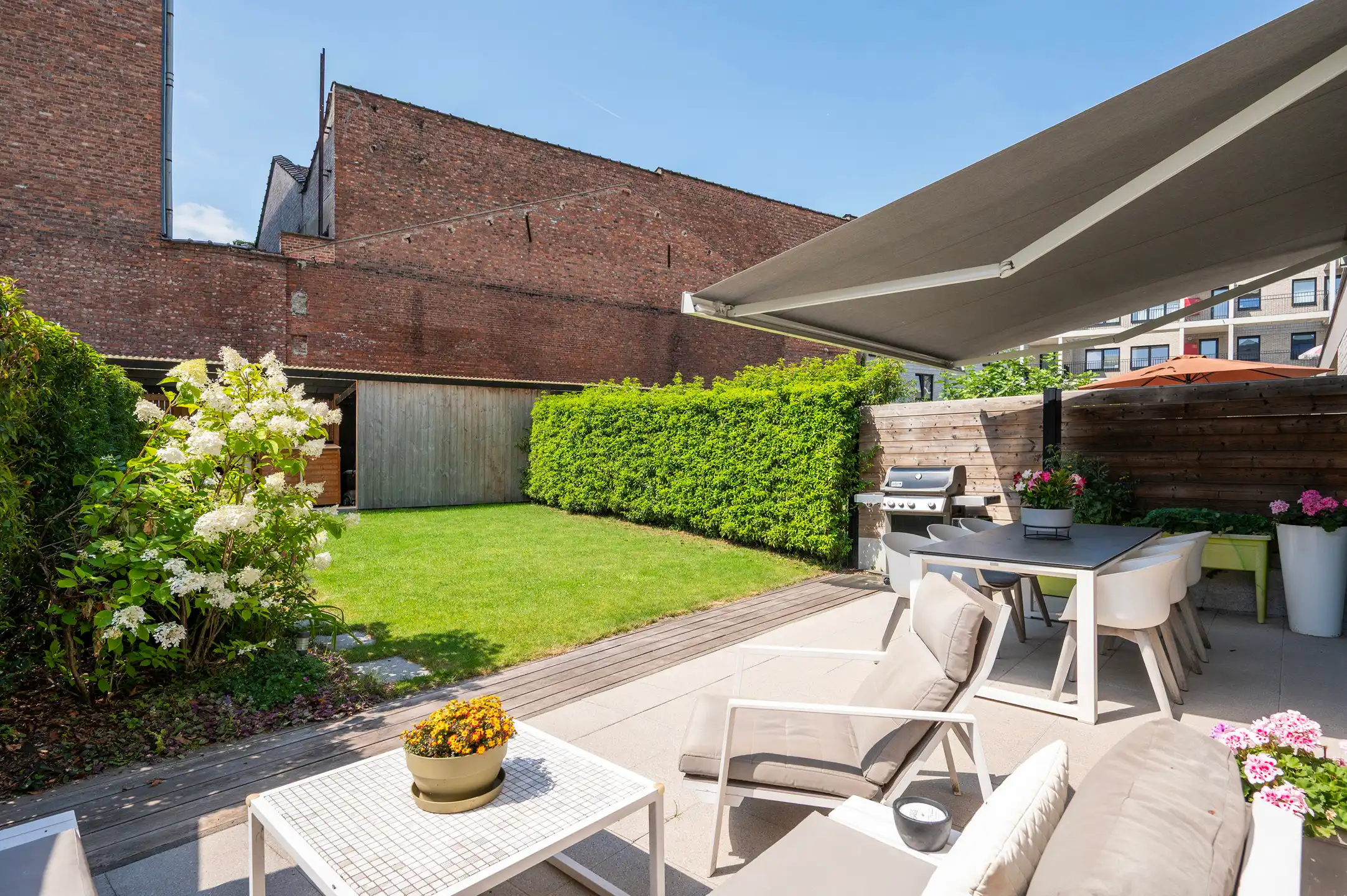 Instapklaar gelijkvloers appartement met zonnige tuin foto 10