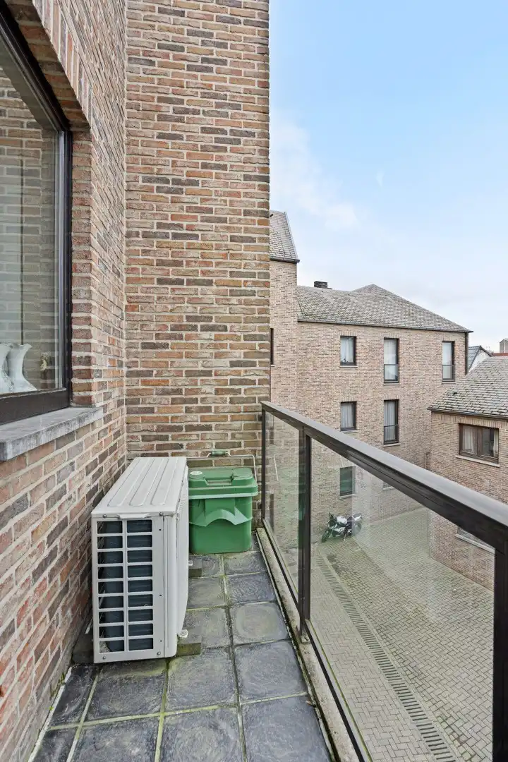 INVESTERINGSPAND: Ruim appartement met garage en zicht op de middeleeuwse Wallen te Tongeren foto 19