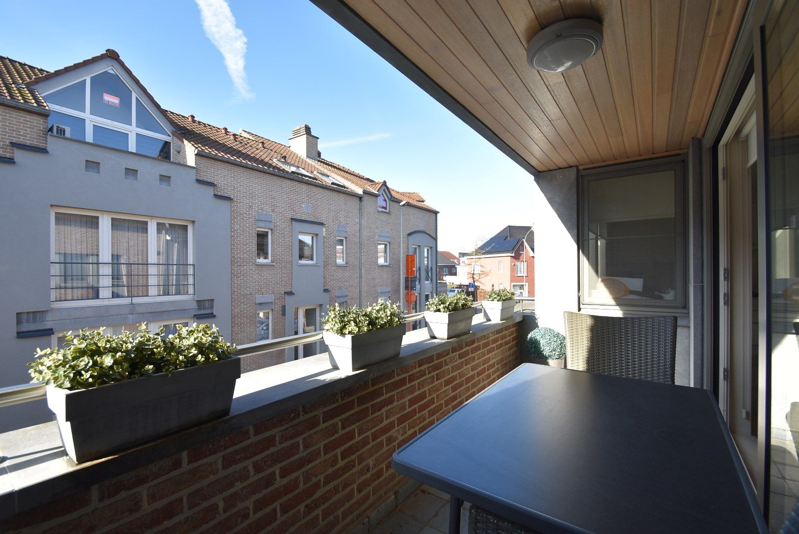 Zeer nette en ruime stadswoning/duplex-appartement met inpandige garage in hartje Bilzen foto 18