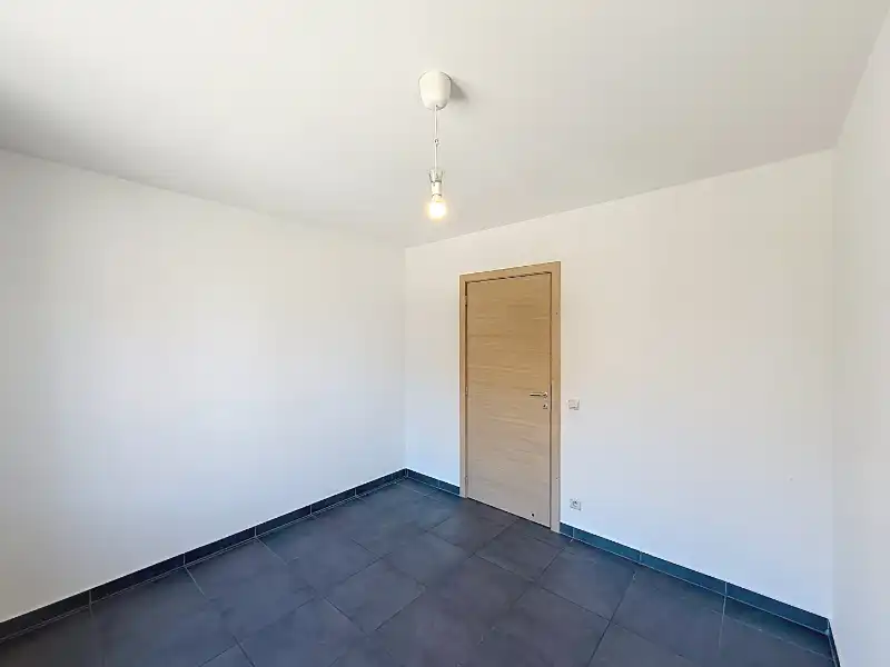 Lichtrijk appartement met ruim terras + garage foto 7