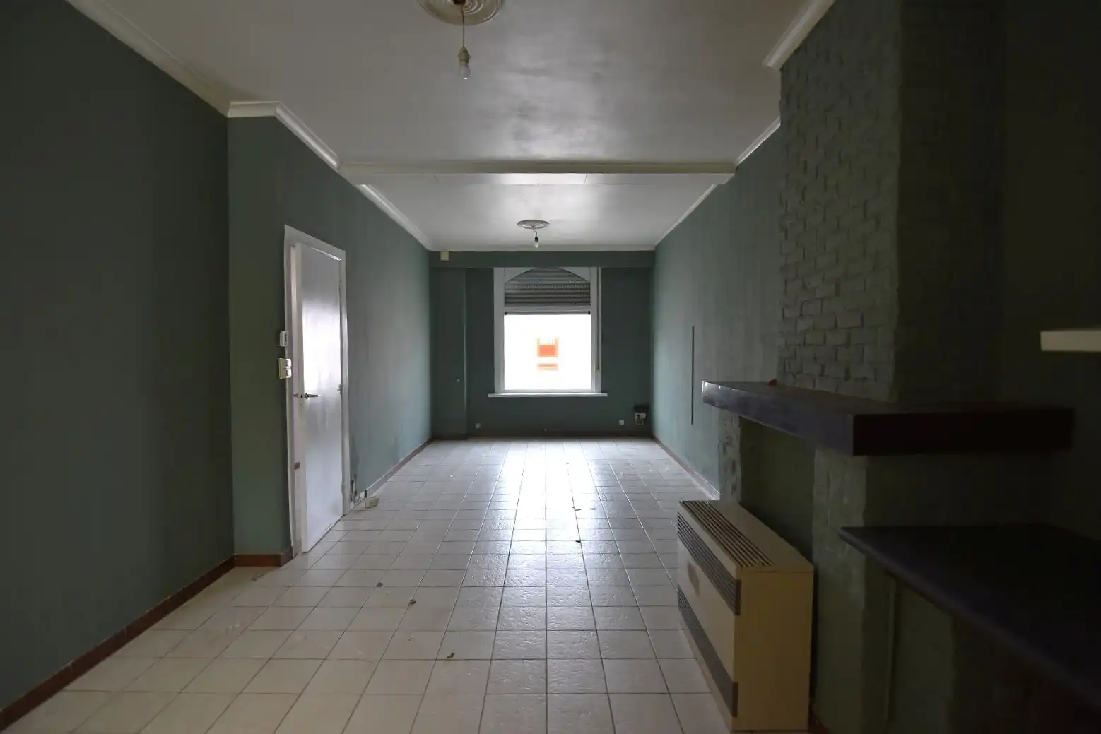 Te renoveren rijwoning met goeie ligging foto 5
