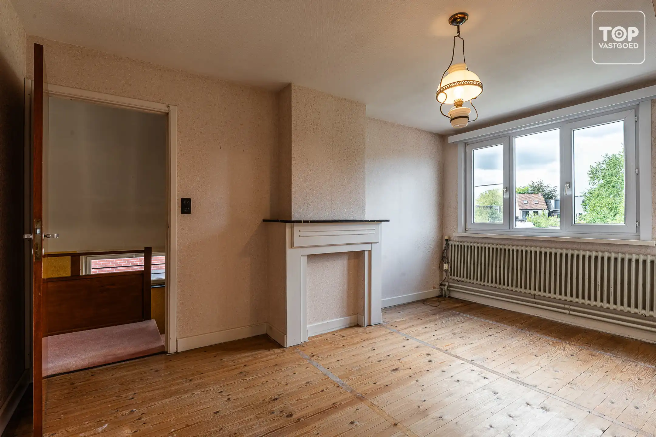 Te renoveren halfopen bebouwing met 3 slaapkamers, garage en ruime tuin op perceel van +-600 m² foto 13