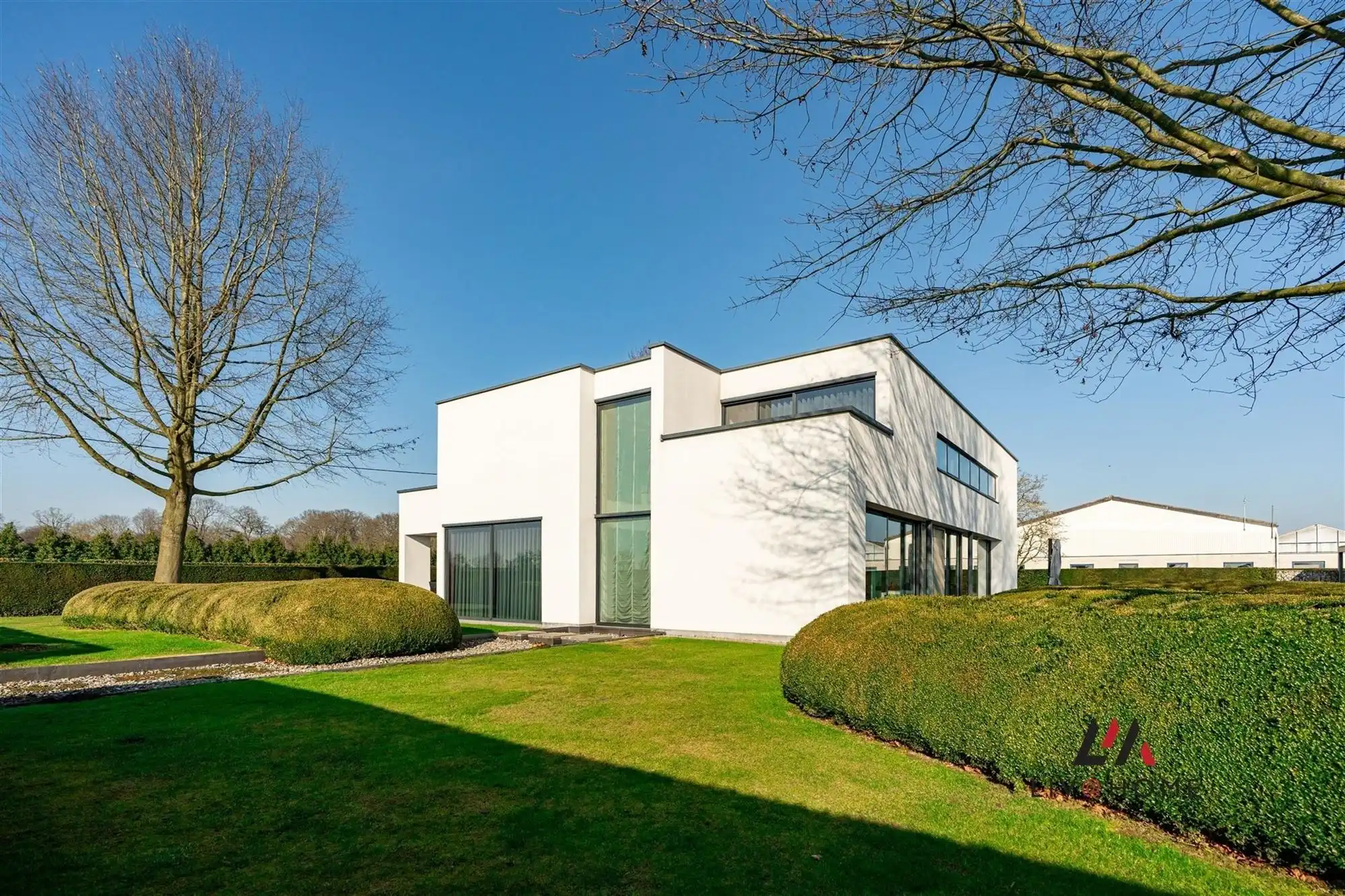 Moderne landbouwwoning met serre en loods op 10 ha foto 5