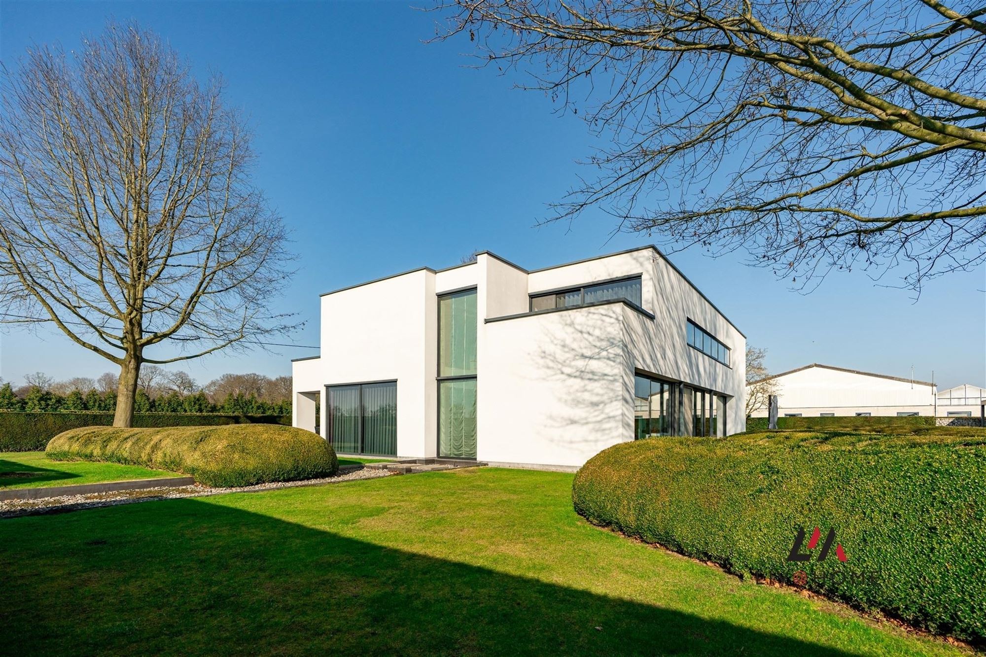 Moderne landbouwwoning met serre en loods op 10 ha foto 5