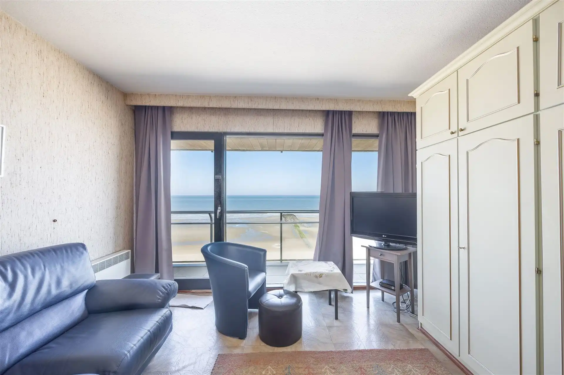 studio foto {{pictureIndex}}