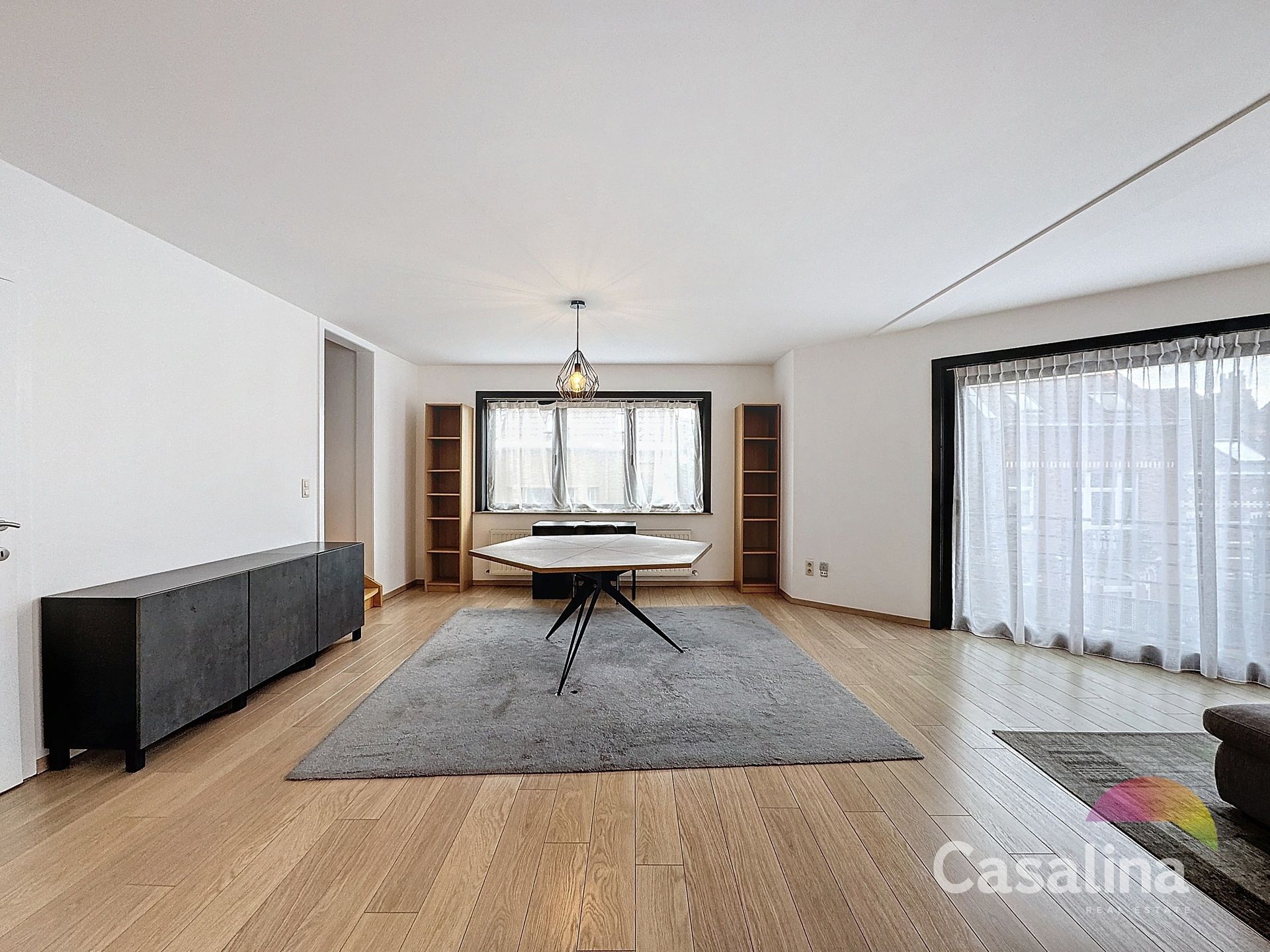 Moderne duplex 95m² met terras, parking en kelder foto 2