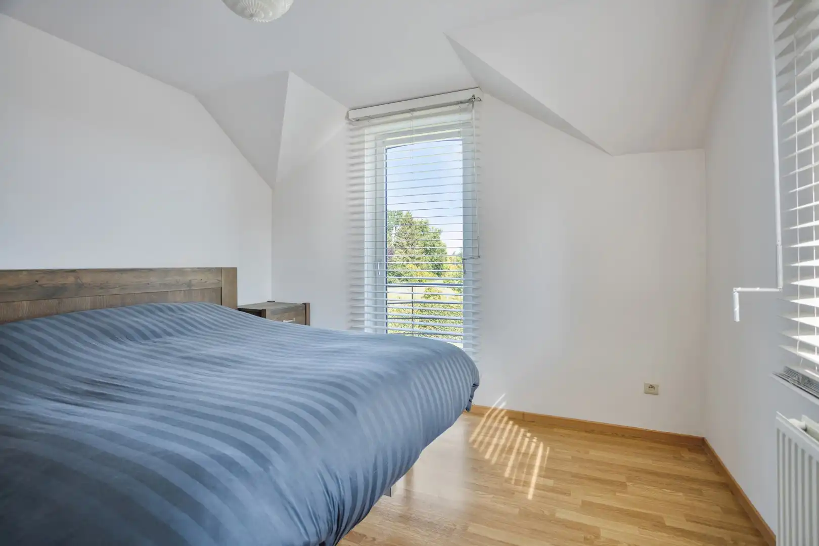 Verzorgde woning met 3 slaapkamers, garage, zonnepanelen en zonnige tuin te Tongeren foto 13