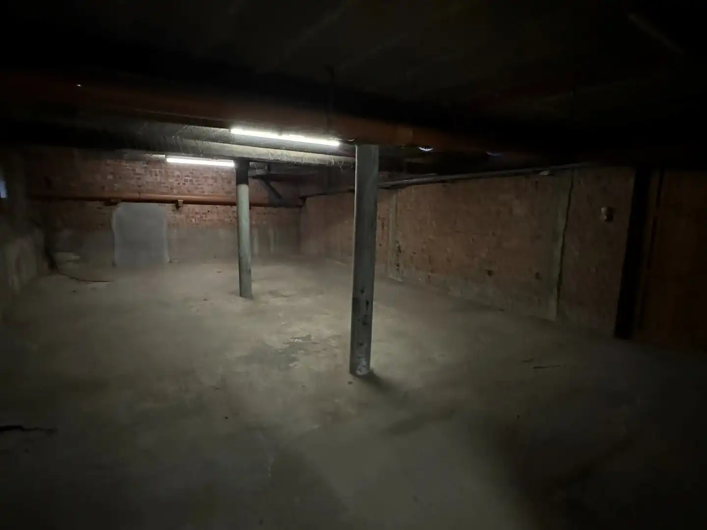 Gelijkvloersppartement met 3 slpk, dubbele garage, tuin en ruime kelder (120 m²) foto 20