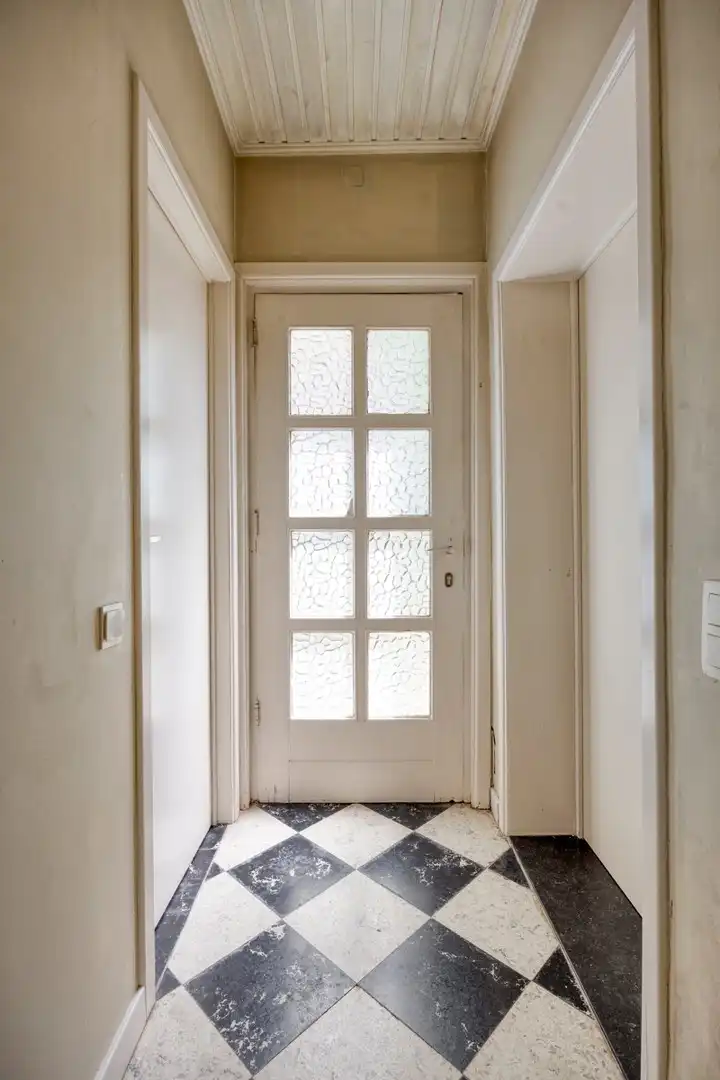 Bijzonder historisch herenhuis te koop in Heppen foto 26