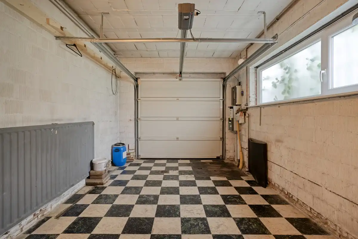 Op te frissen gelijkvloerse woning met 1 slaapkamer en garage! foto 11