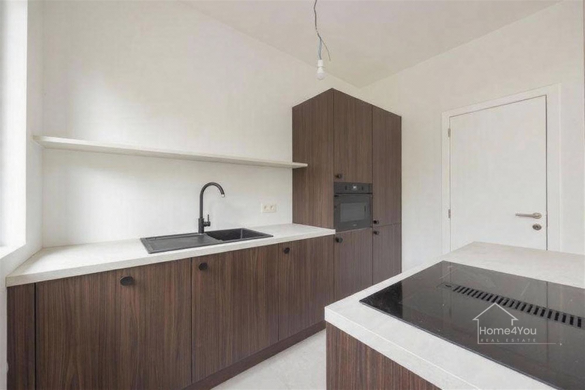 Gerenoveerd 2-slaapkamer appartement in Borsbeek te koop! foto 2