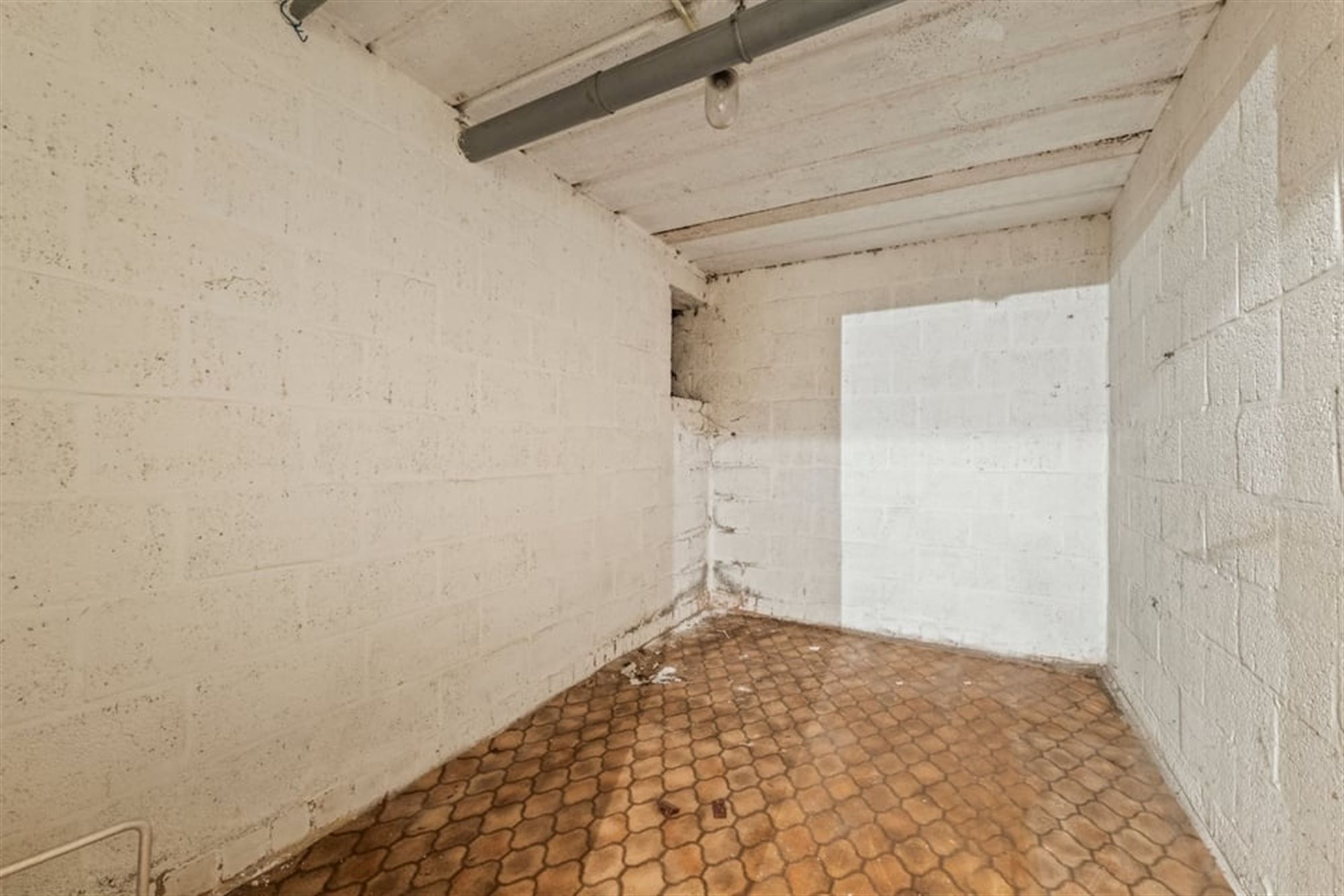 OPBRENGSTEIGENDOM MET 6 APPARTEMENTEN EN 4 STAANPLAATSEN IN SINT-TRUIDEN  foto 14