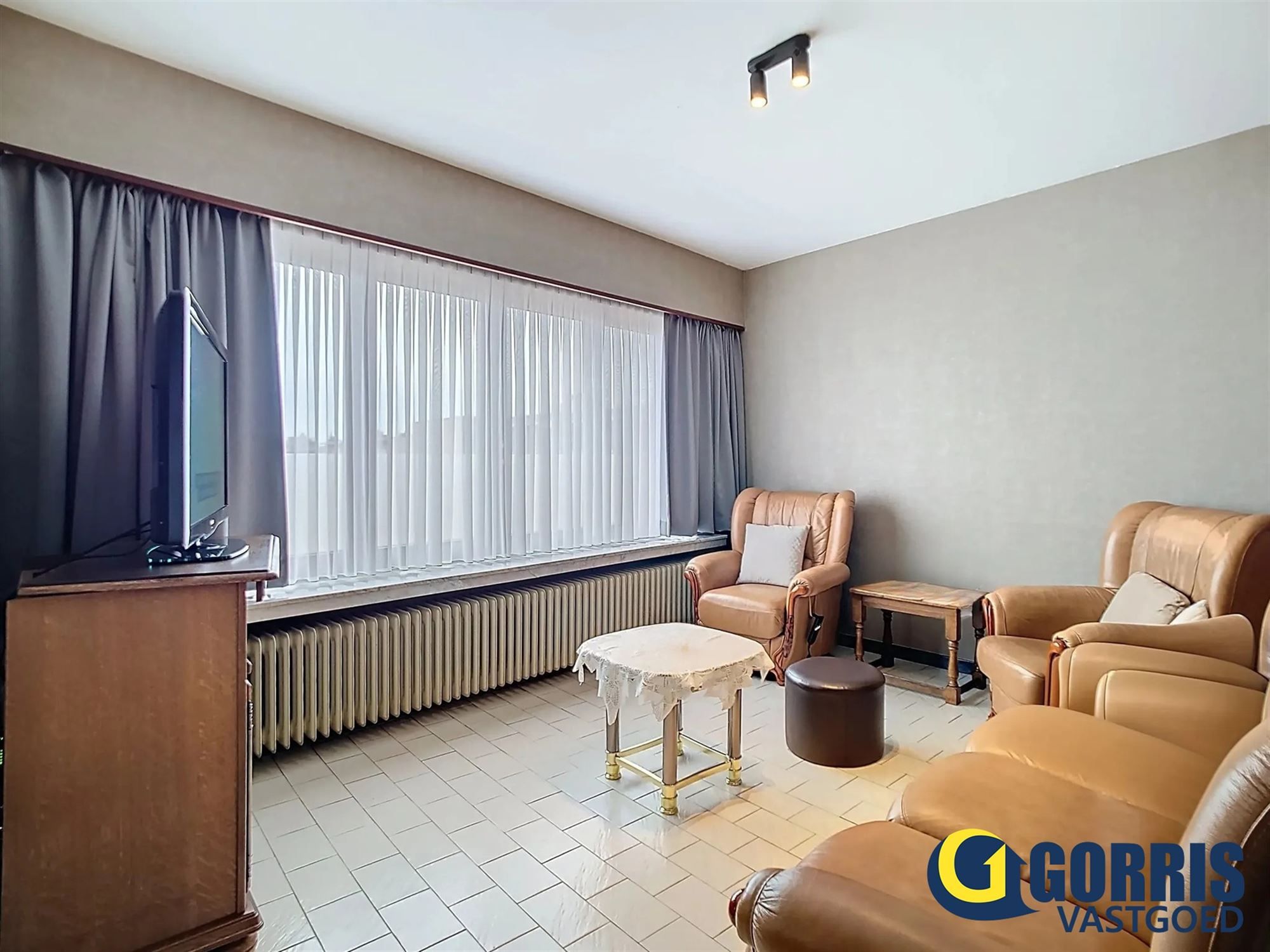 Wonen in het centrum van Heist-op-den-Berg? Dit ruime appartement verrast op elk vlak! foto 4