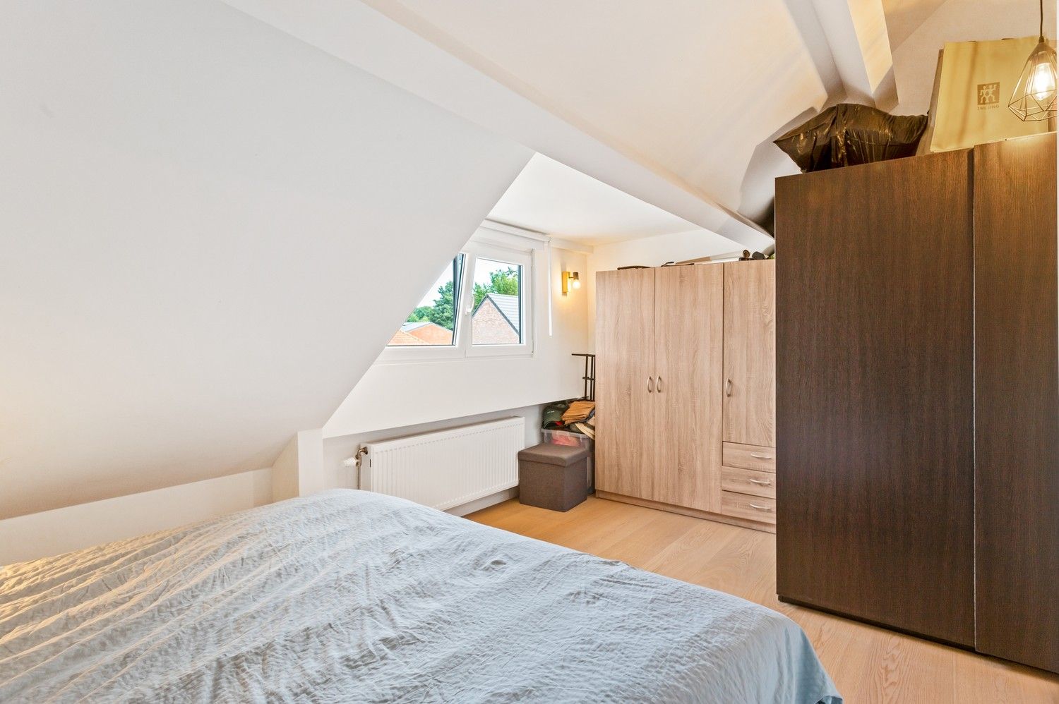 Prachtig instapklare duplex appartement met 2 slaapkamers, een garagebox en terras in Schoten! foto 11