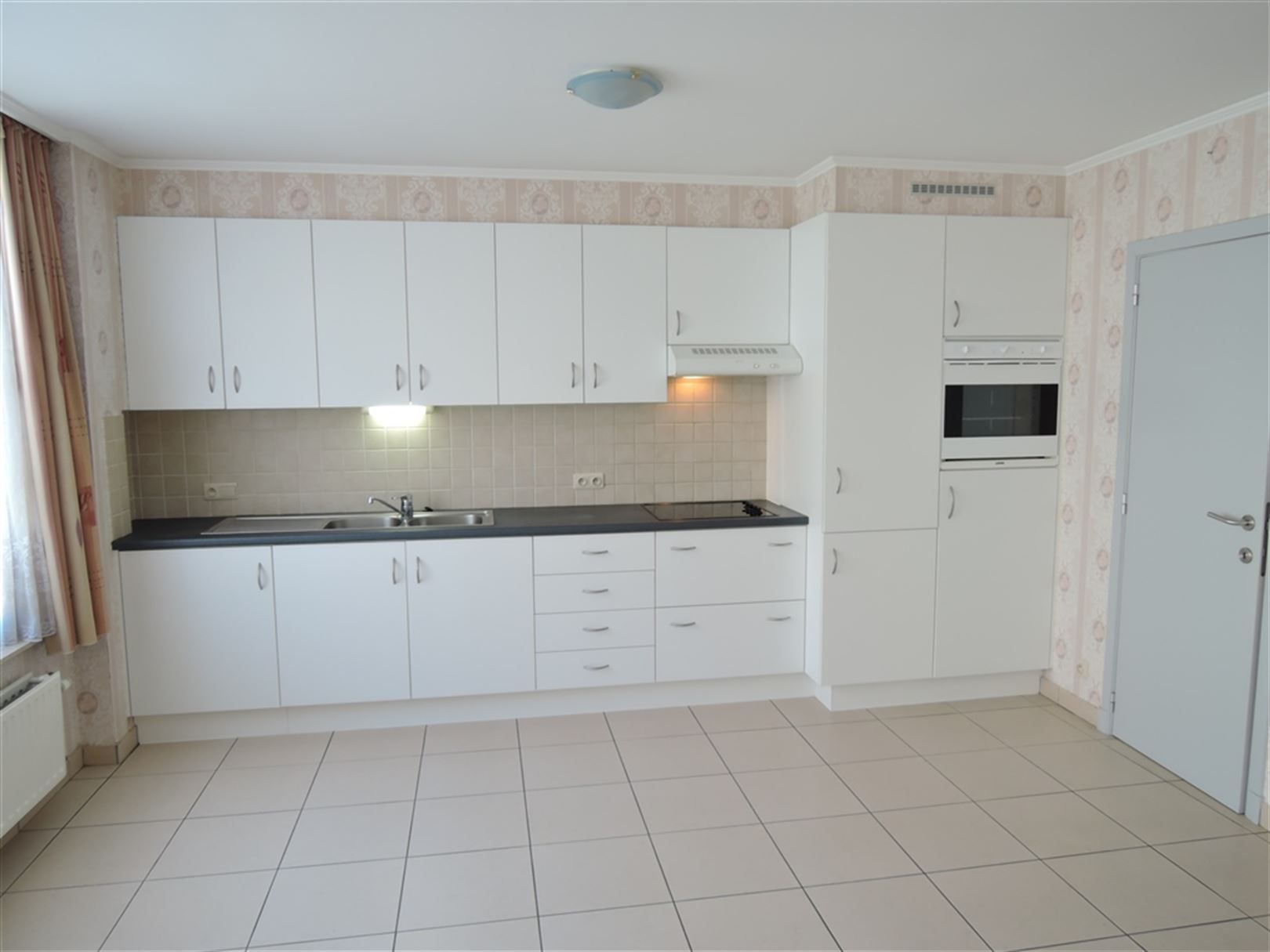 Gelijkvloers appartement met garage box foto 5