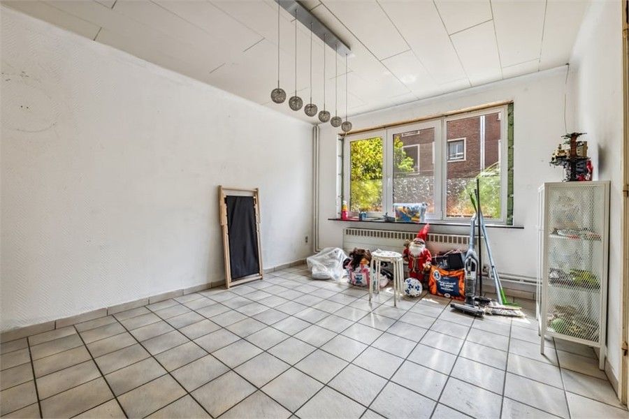 KNUSSE GEZINSWONING MET GEZELLIGE STADSTUIN IN HASSELT foto 6