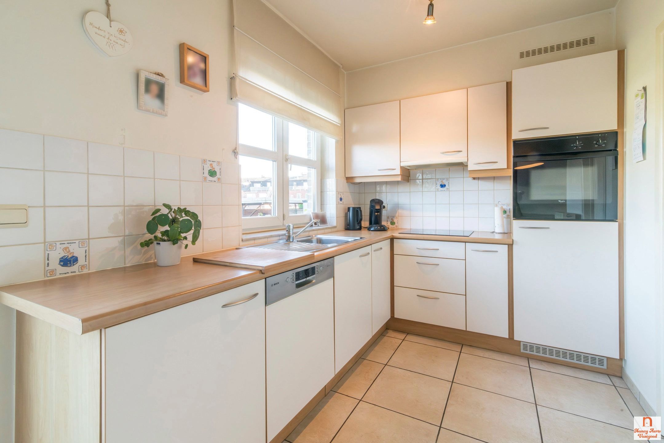 Lichtrijk gelijkvloers appartement met tuinzicht in Kuringen foto 10